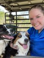 Susan on the mule with Bandit and Piper