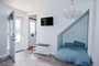 Downstairs living and favorite bed for kids of all ages!  Also, access to stairs and 2nd level.